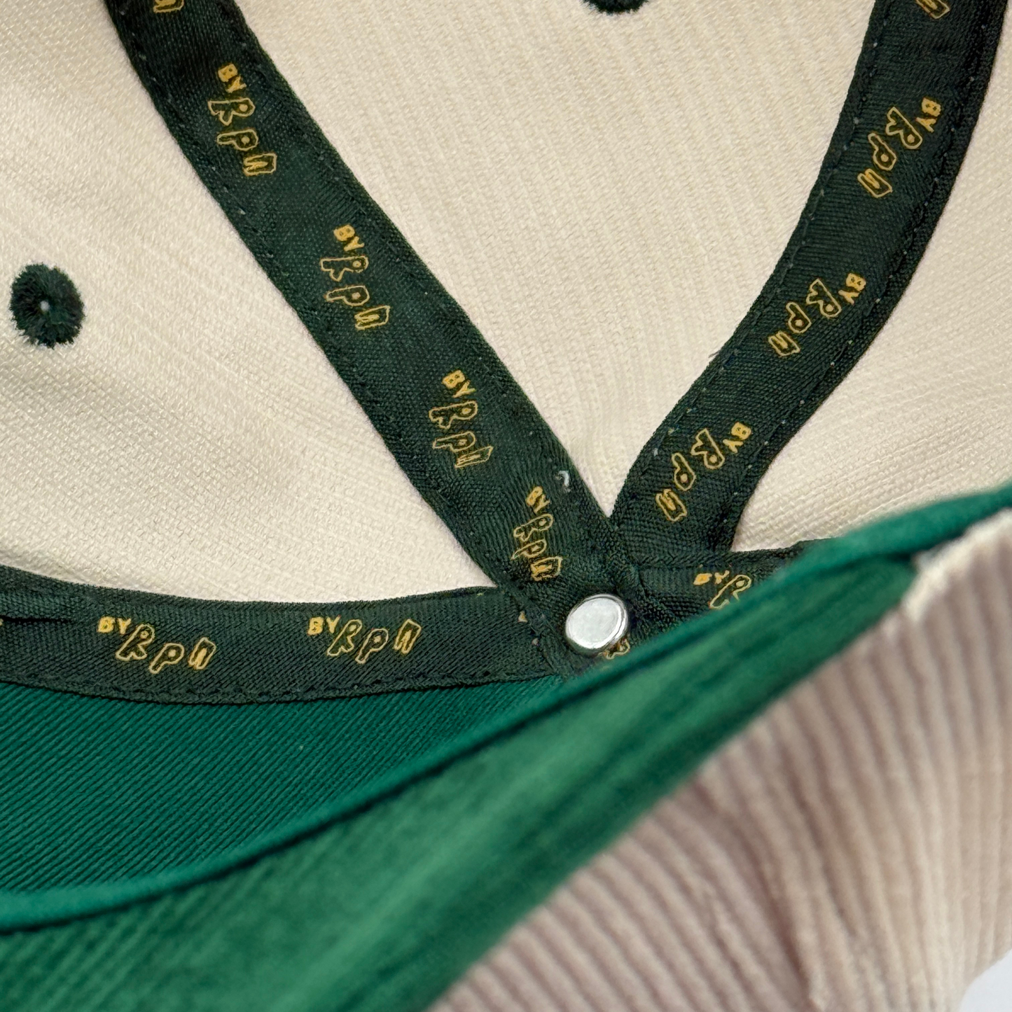 'Broski Brewski' corduroy trucker snapback in off white and racing green