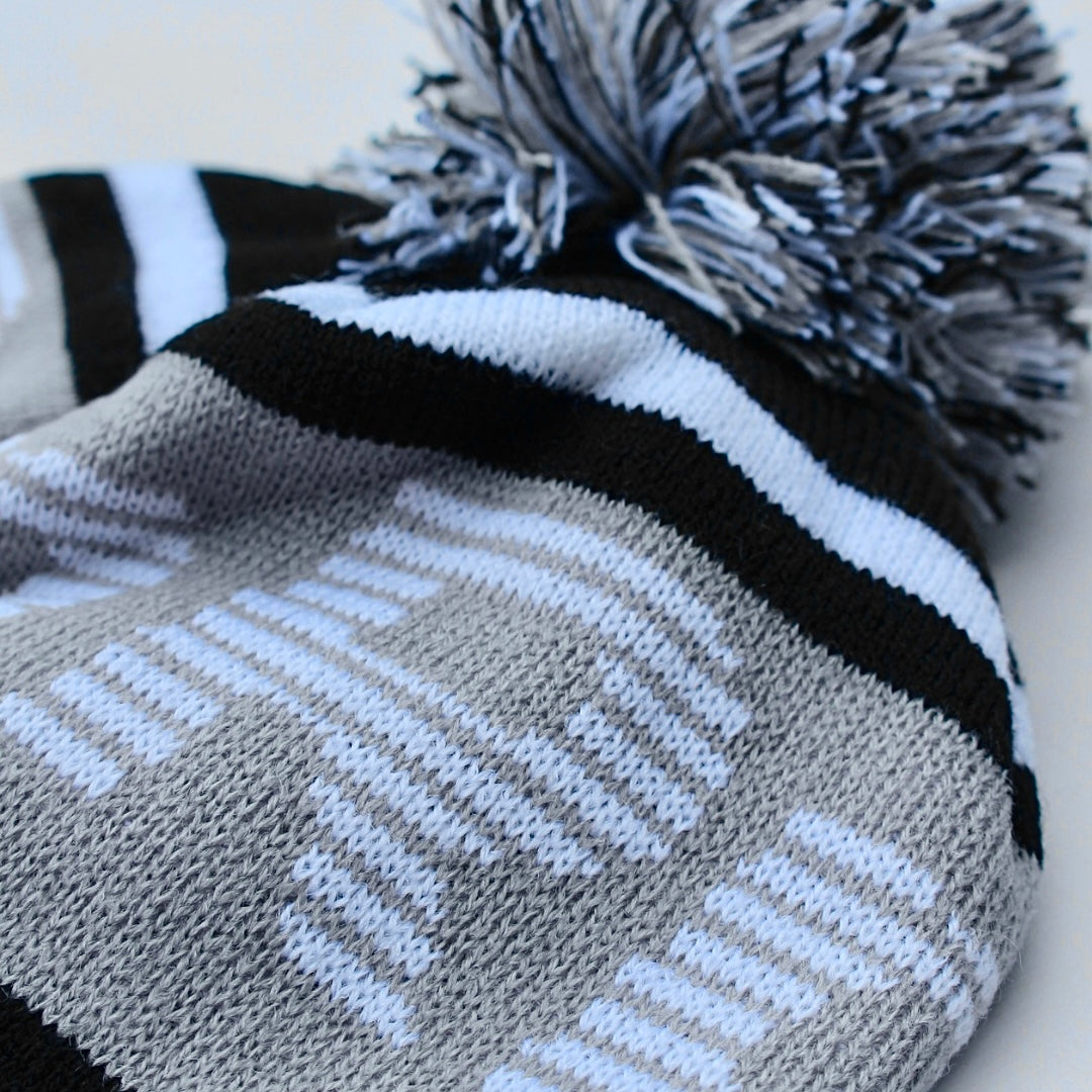 ski inspired bobble hat beanie with #misc2 logo